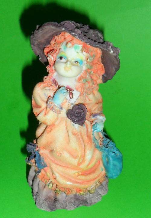 Young Lady Colourful Figurine