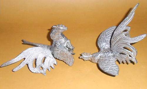 Two Ornamental Metal Type Fighting Cockrells