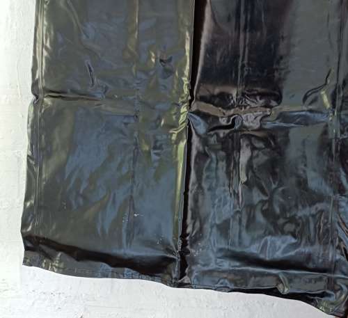 Vintage 1976 shiny black PVC raincoat