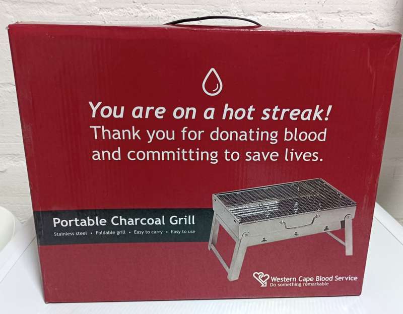 Portable stainless steel charcoal grill