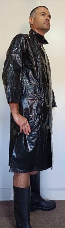 Vintage 1975 shiny black raincoat with metal clasp closure
