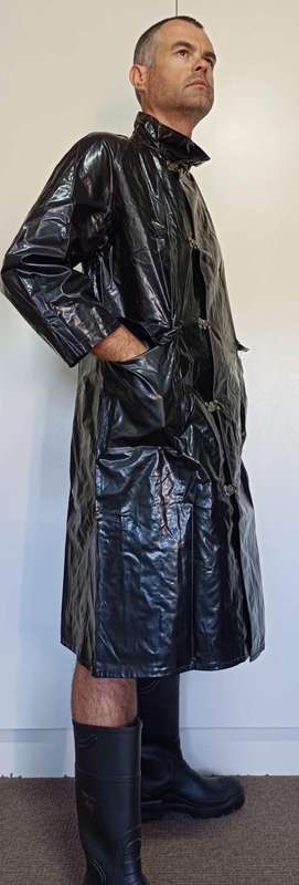 Vintage 1975 shiny black raincoat with metal clasp closure
