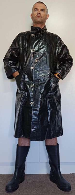 Vintage 1975 shiny black raincoat with metal clasp closure
