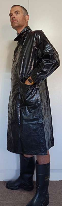 Vintage 1975 shiny black raincoat with metal clasp closure