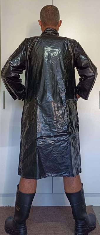 Vintage 1975 shiny black raincoat with metal clasp closure
