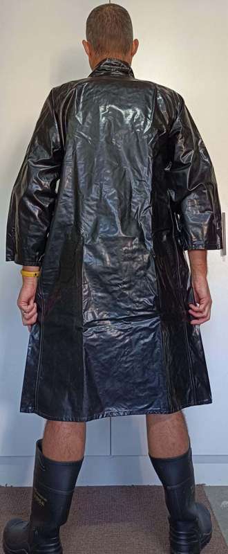 Vintage 1975 shiny black raincoat with metal clasp closure