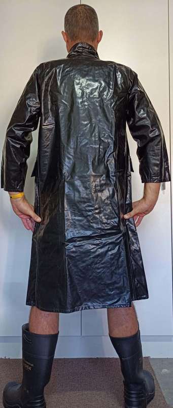 Vintage 1975 shiny black raincoat with metal clasp closure