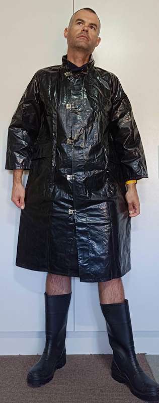 Vintage 1975 shiny black raincoat with metal clasp closure
