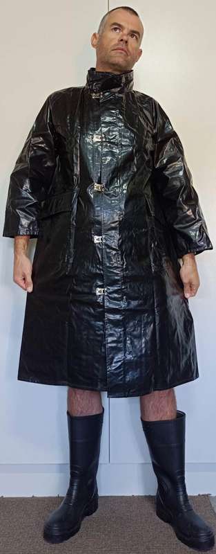 Vintage 1975 shiny black raincoat with metal clasp closure