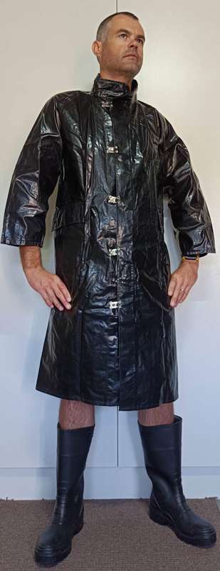 Vintage 1975 shiny black raincoat with metal clasp closure