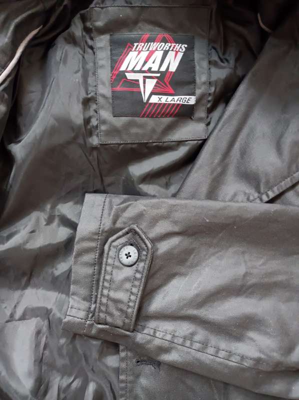Truworths Man rain jacket in size XL. Double breasted, removeable hood