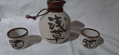 ** Japanese 20th Century Ceramic Sake Decanter and Two Cups (13cm). **