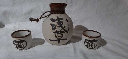 ** Japanese 20th Century Ceramic Sake Decanter and Two Cups (13cm). **