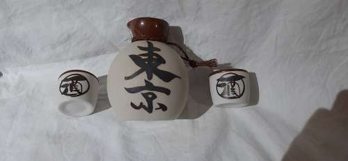 ** Japanese 20th Century Ceramic Sake Decanter and Two Cups (13cm). **