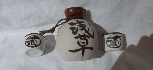 ** Japanese 20th Century Ceramic Sake Decanter and Two Cups (13cm). **
