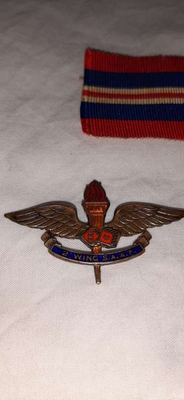 **ORIGINAL- RARE!! WWII S.A.A.F Medal and Wing Insignia Group for 2 Wing Heavy Bomber Squadron.**