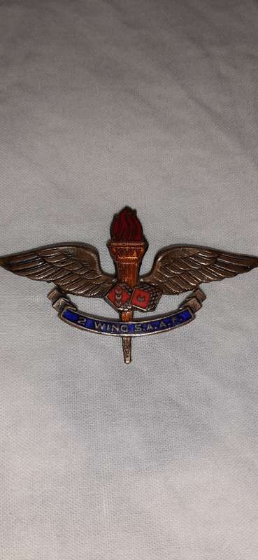 **ORIGINAL- RARE!! WWII S.A.A.F Medal and Wing Insignia Group for 2 Wing Heavy Bomber Squadron.**