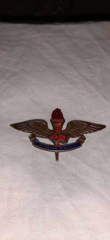 **ORIGINAL- RARE!! WWII S.A.A.F Medal and Wing Insignia Group for 2 Wing Heavy Bomber Squadron.**
