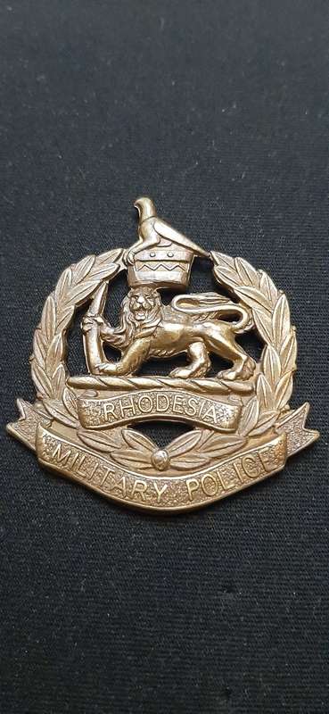 ** Rhodesian Bush War: Corps of Military Police Brass Cap Badge.**