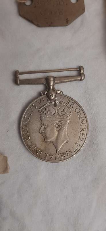 **WWII (1939-1945) Poplett Family Medal and Identity Disc Set (Husband and Wife) Lot #3.**