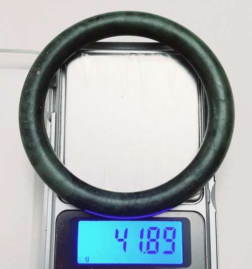 ** STUNNING: Early 20th Century Chinese Spinach Green Serpentine  Bangle (8cm Diam.).**