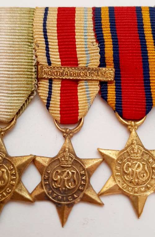 ** WWI and WWII British Mounted Miniature Medals with (Mercantile Marine Medal) [x7].**