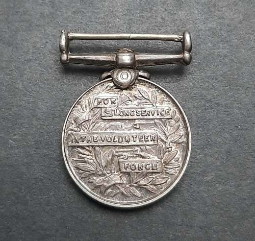** KGV Long Service in Volunteer Force (Colonies) Miniature Medal. **