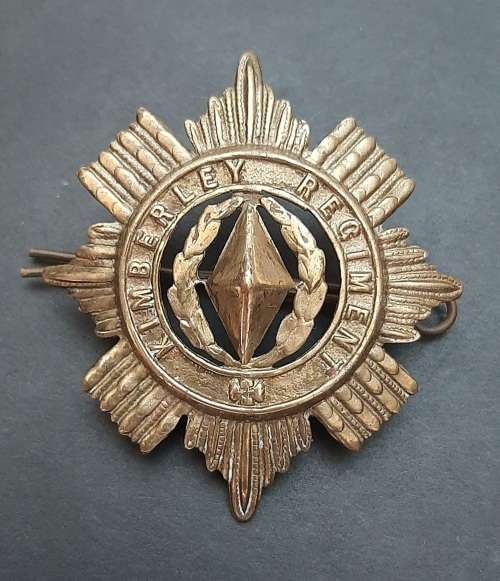 ** 1899-1939 Kimberley Regiment Voided Cap Badge w/ Pin (6cm x 6cm).**