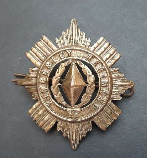 ** 1899-1939 Kimberley Regiment Voided Cap Badge w/ Pin (6cm x 6cm).**