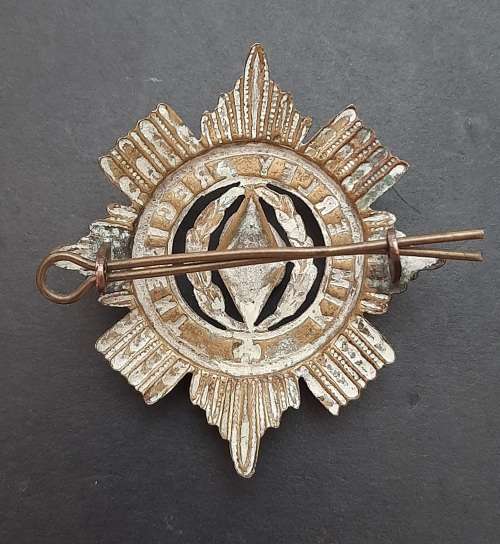 ** 1899-1939 Kimberley Regiment Voided Cap Badge w/ Pin (6cm x 6cm).**
