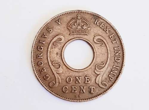 ** 1928  KGV East Africa 1c Coin `KN`  [ F/VF ].**