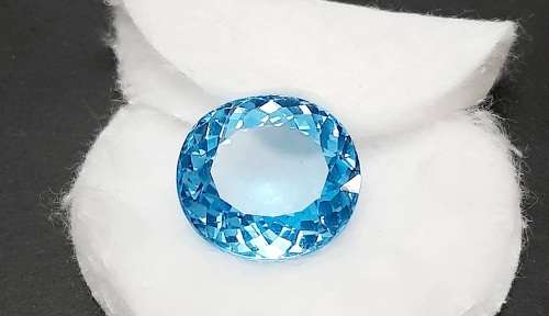 STUNNING: 53.05  carat VVS  `Swiss Blue` Natural Oval Cut Topaz w/ Certification.**