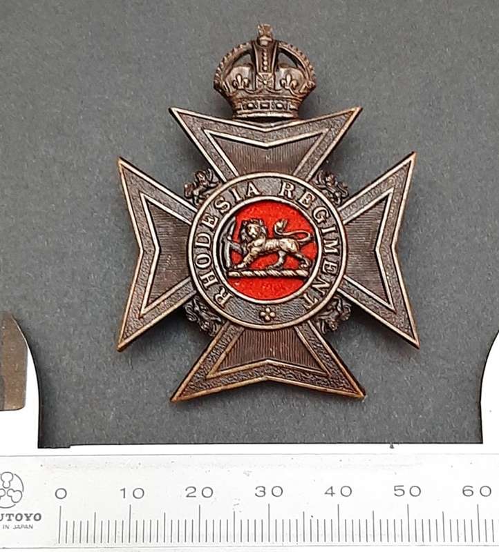 **WW2 Rhodesia Regiment Officer`s Large Cap Badge w/ Slide.**