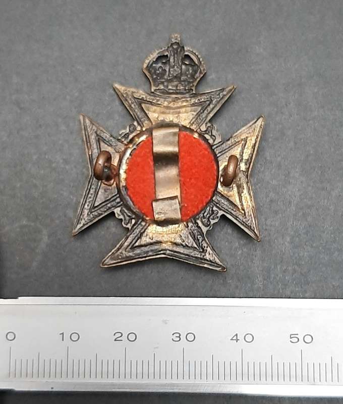 **WW2 : Rhodesia Regiment  Cap Badge w/ Lugs .**