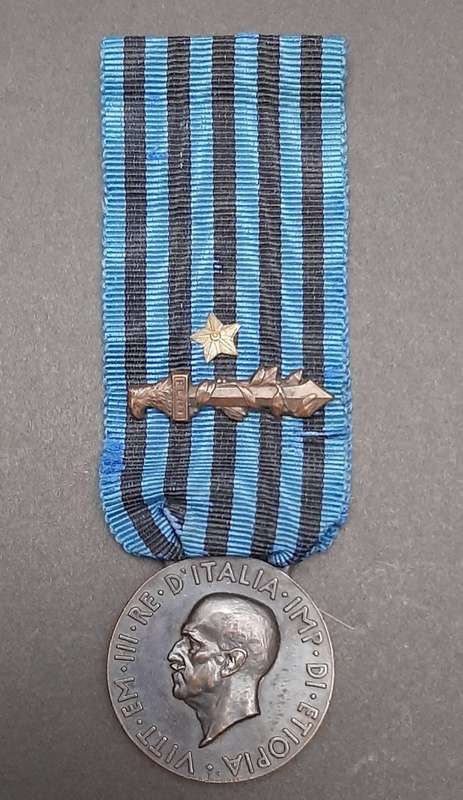 **RARE: 1936 Italian Africa Orientale Fascist Medal w/ Ribbon Devices (Combat & Valour)**