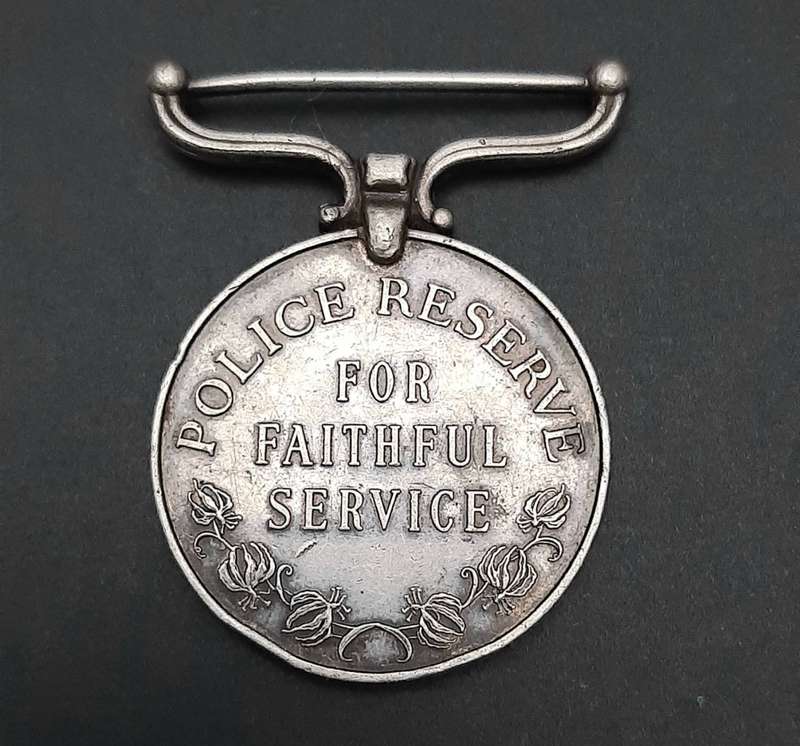 **RARE: 1960s Rhodesian Police Reserve Faithful Service Medal (att. Native).**