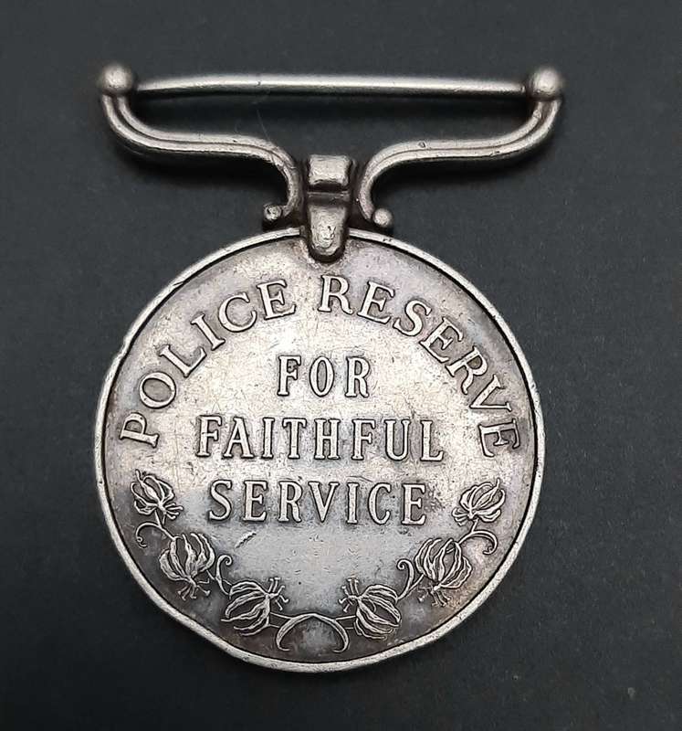 **RARE: 1960s Rhodesian Police Reserve Faithful Service Medal (att. Native).**