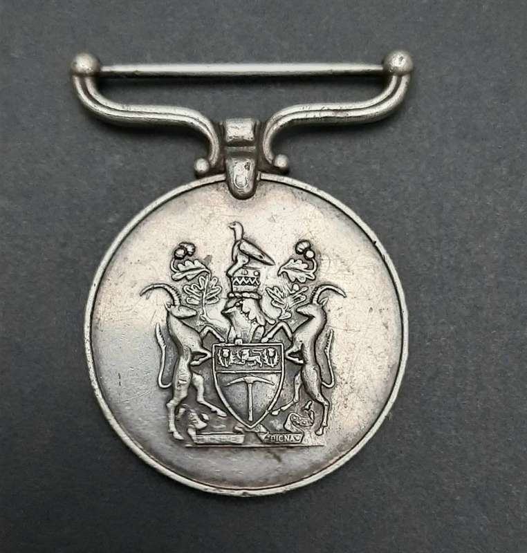**RARE: 1960s Rhodesian Police Reserve Faithful Service Medal (att. Native).**