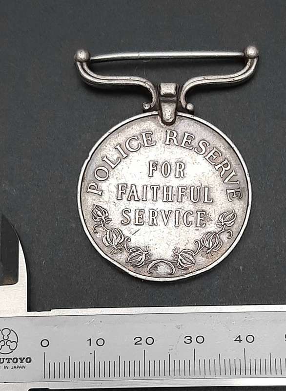 **RARE: 1960s Rhodesian Police Reserve Faithful Service Medal (att. Native).**