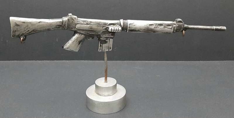 **Rhodesian Bush War: FN FAL Rifle Cast Desk  Model on Plinth (29cm x 12cm).**