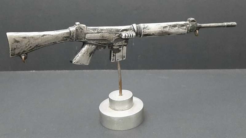 **Rhodesian Bush War: FN FAL Rifle Cast Desk  Model on Plinth (29cm x 12cm).**