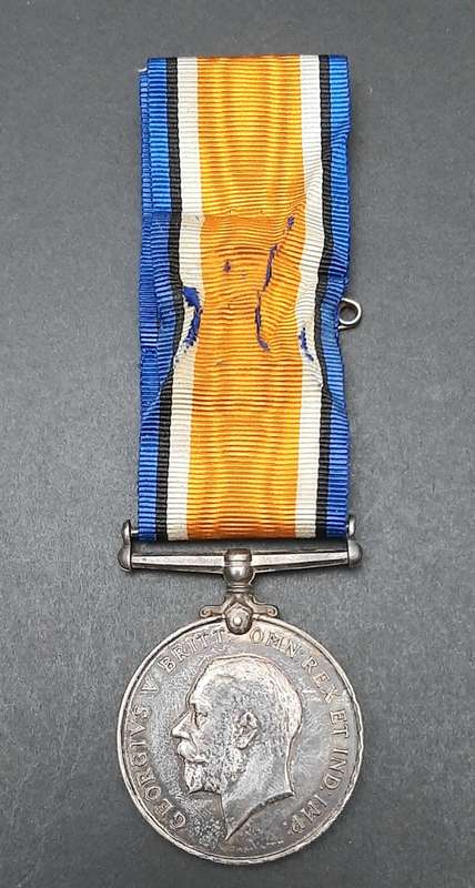 **WW1 UDF: .925 Silver British War Medal w/ Silk Ribbon (4th Dist. Mtd. Rifles).**