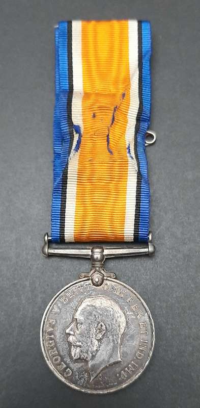 **WW1 UDF: .925 Silver British War Medal w/ Silk Ribbon (4th Dist. Mtd. Rifles).**