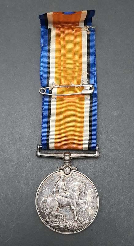 **WW1 UDF: .925 Silver British War Medal w/ Silk Ribbon (4th Dist. Mtd. Rifles).**