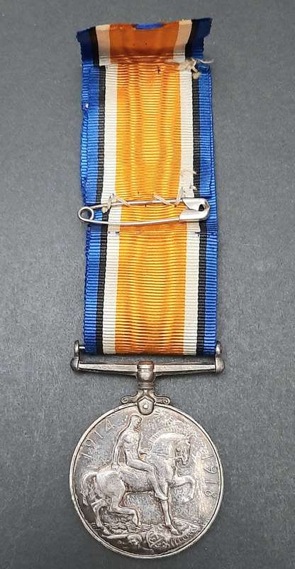 **WW1 UDF: .925 Silver British War Medal w/ Silk Ribbon (4th Dist. Mtd. Rifles).**