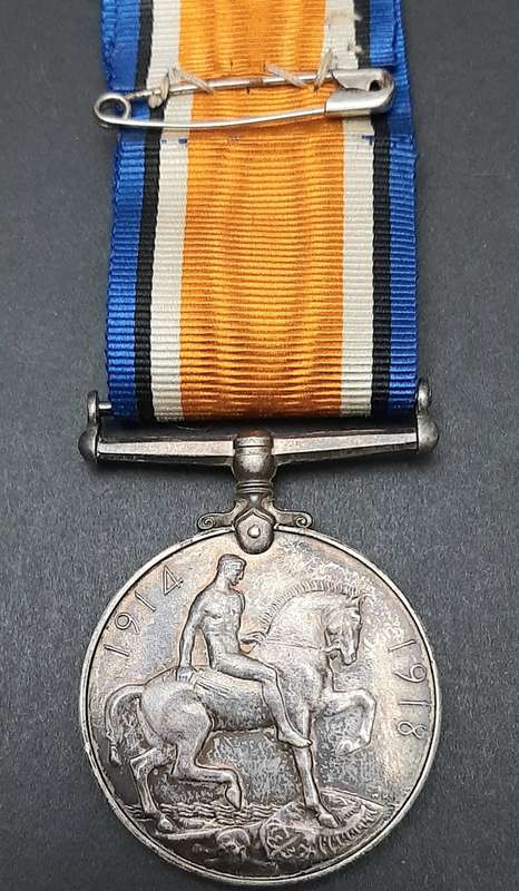 **WW1 UDF: .925 Silver British War Medal w/ Silk Ribbon (4th Dist. Mtd. Rifles).**