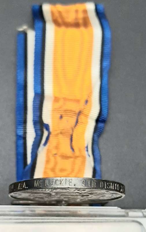 **WW1 UDF: .925 Silver British War Medal w/ Silk Ribbon (4th Dist. Mtd. Rifles).**