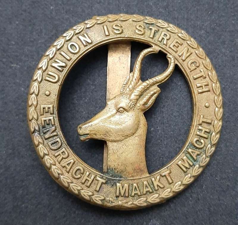 **RARE: WW1 SA Infantry Cap Badge w/ Slide (S.A.E.F).**