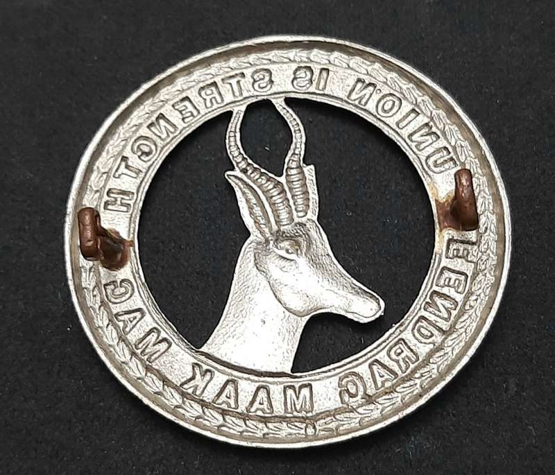**WW2 UDF: White Metal General Service Cap Badge w/ Lugs .**
