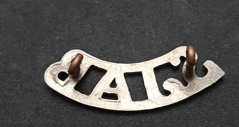 **WW2 St. John Ambulance White Metal Shoulder Title (Lugs Intact).**